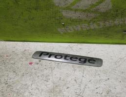 Эмблема для Mazda 323 BJ Protege Familia 1998-2002  запчасти бу