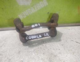 Скоба суппорта заднего для Toyota Corolla E12 2001-2006  запчасти бу
