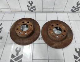 Диск тормозной передний не вентилируемый для Opel Corsa C 2000-2006  запчасти бу